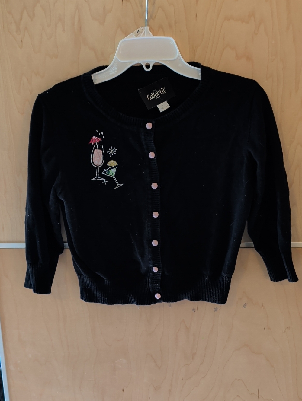 Collectif Black Cropped Cardigan with Pink Buttons and Cocktail Motif